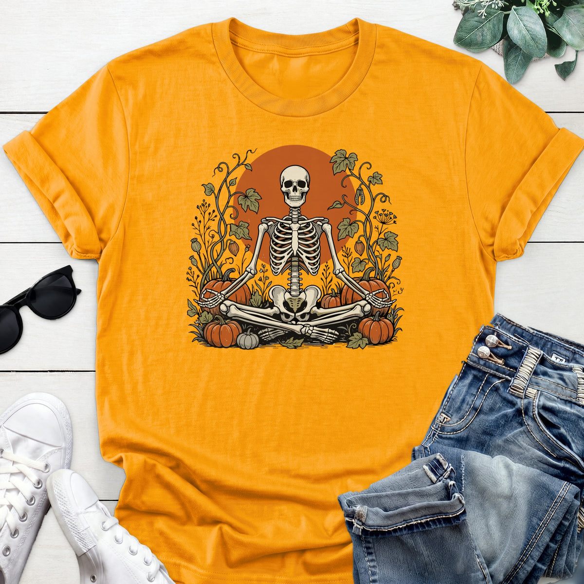 Meditating Skeleton Pumpkin Patch Tee — Gold