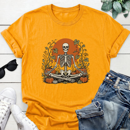 Meditating Skeleton Pumpkin Patch Tee — Gold
