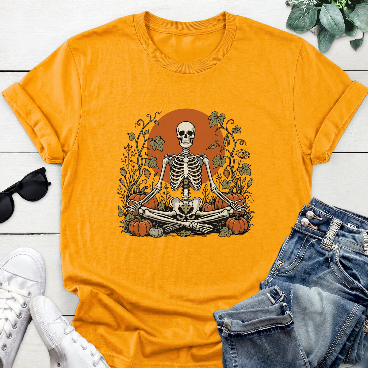 Meditating Skeleton Pumpkin Patch Tee — Gold